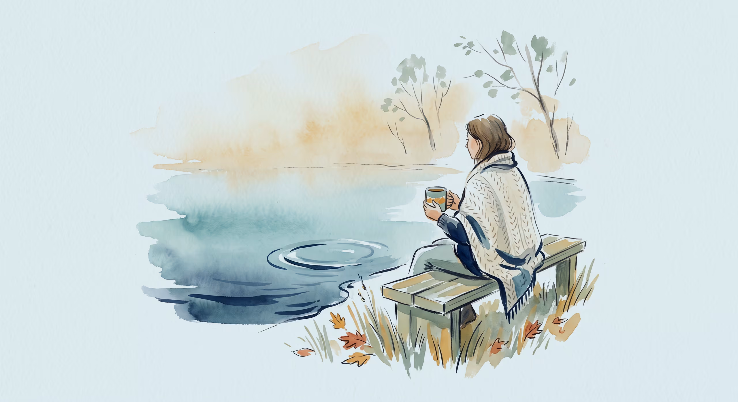 A watercolour illustration — a person wrapped in a knit blanket sits on a bench by a still lake at dawn, holding a warm mug.